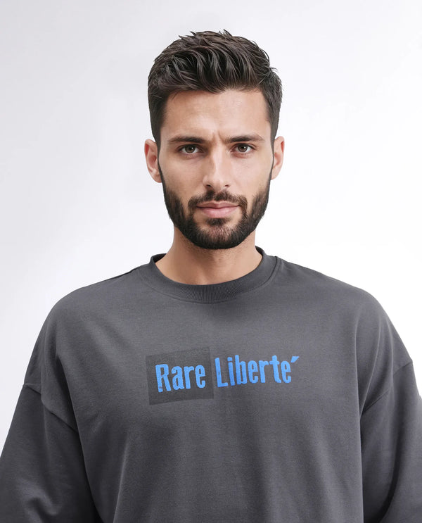 Rare Rabbit Men Moshe Grey Cotton Fabric Short Sleeve Oversized Fit Graphic Printed T-Shirt