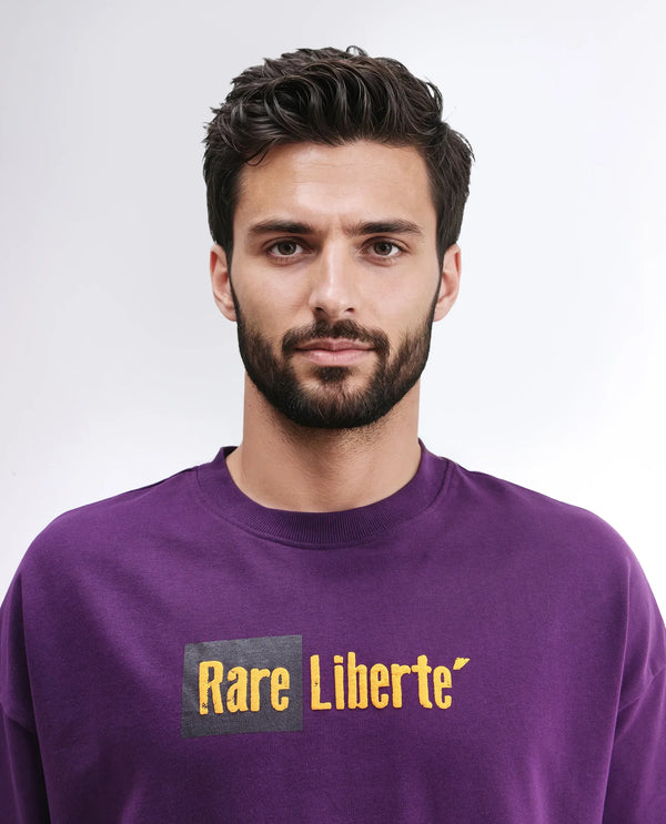 Rare Rabbit Men Moshe Purple Cotton Fabric Short Sleeve Oversized Fit Graphic Printed T-Shirt