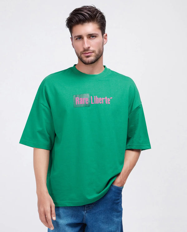 Rare Rabbit Men Moshe Green Cotton Fabric Short Sleeve Oversized Fit Graphic Printed T-Shirt