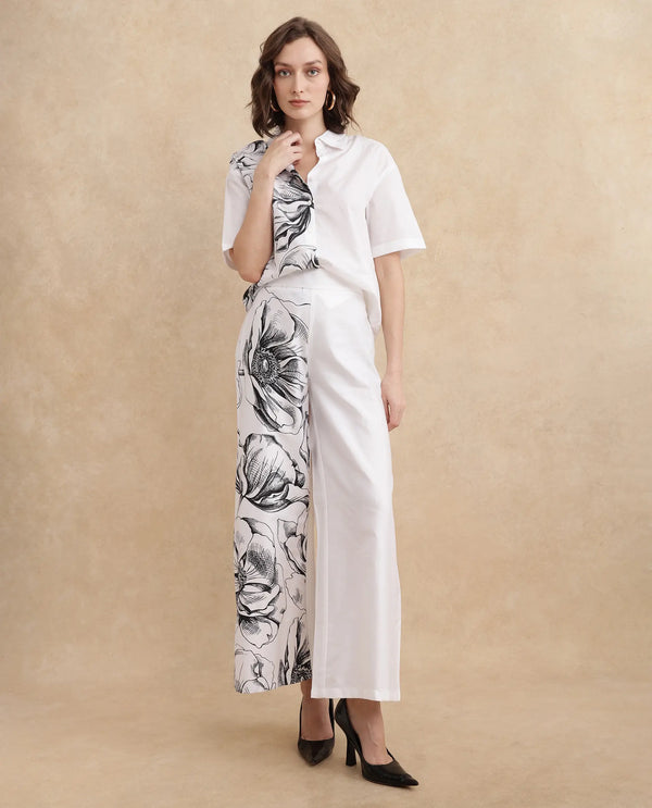 Rareism Women Neilsono White Cotton Satin Fabric Tie-Up Closure Flared Fit Ankle Length Floral Print Trouser