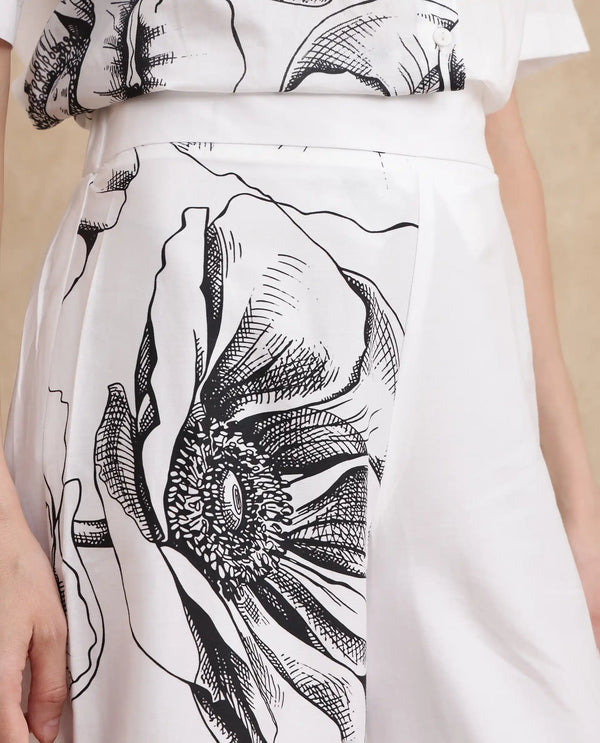 Rareism Women Neilsono White Cotton Satin Fabric Tie-Up Closure Flared Fit Ankle Length Floral Print Trouser