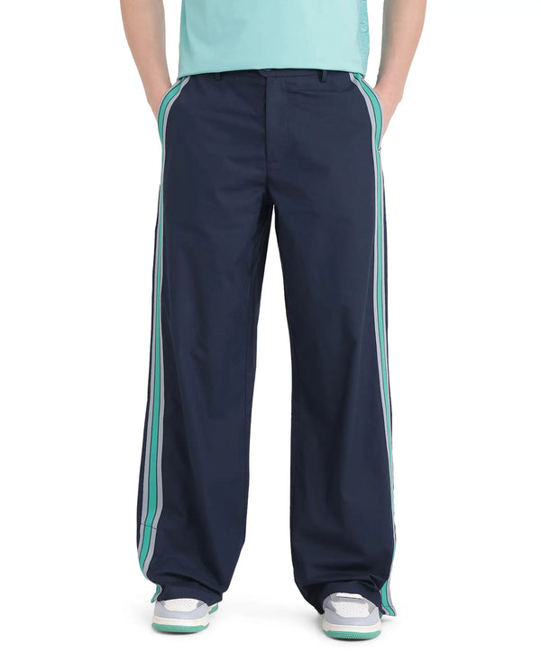 Rare Rabbit Men Newnon Navy Cotton Fabric Mid Rise Baggy Fit Side Slit with Snap Button Closure Tape Detailing Track Pant