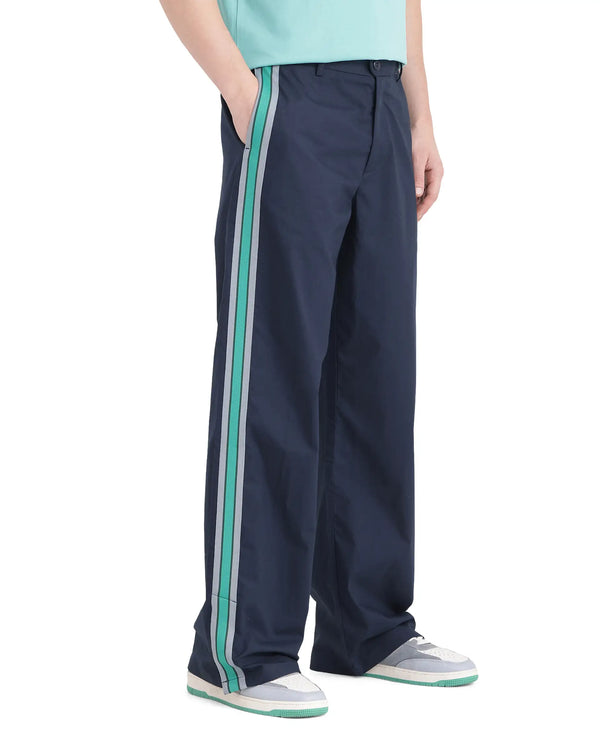 Rare Rabbit Men Newnon Navy Cotton Fabric Mid Rise Baggy Fit Side Slit with Snap Button Closure Tape Detailing Track Pant