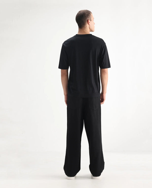 Rare Rabbit Men's Niob Black Cotton Fabric Mid Rise Dark Wash Baggy Fit Solid Jeans