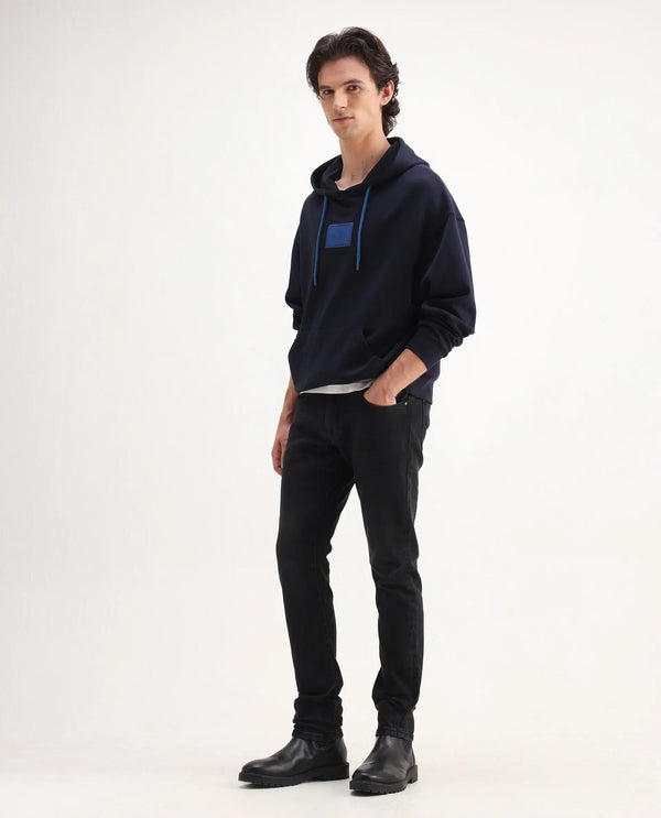 Rare Rabbit Men's Omiros Black Slim Fit Mid Rise Dark Wash With 3D Whiskers Jeans