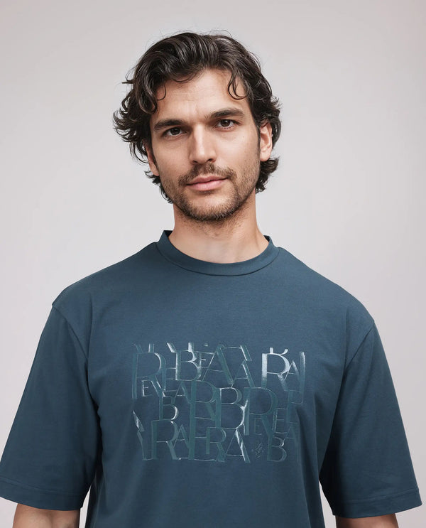 Rare Rabbit Men Ovem Dusky Teal Cotton Blend Fabric Short Sleeve Crew Neck Qlo Fit Graphic Print T-Shirt