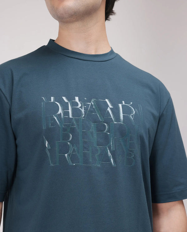 Rare Rabbit Men Ovem Dusky Teal Cotton Blend Fabric Short Sleeve Crew Neck Qlo Fit Graphic Print T-Shirt