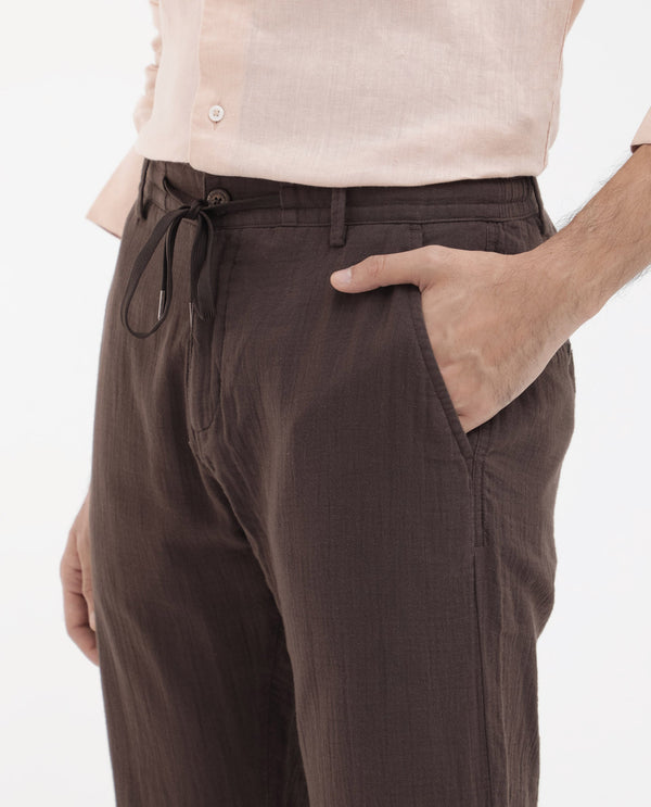 Rare Rabbit Men's Pastor-2 Brown Solid Mid-Rise With Drawstring And Elastic Waistband Regular Fit Trousers