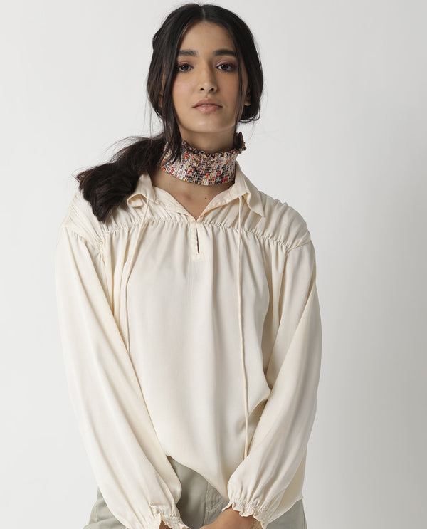 Rareism Women Paxo Off White Poly Cotton Fabric Regular Fit Tie-Up Neck Full Sleeves Solid Top