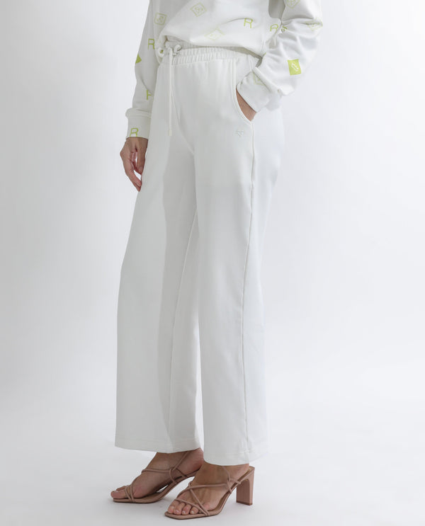Rareism Women Pazoo T Off White Cotton Blend Fabric Flared Solid Mid Rise Ankle Length Track Pant