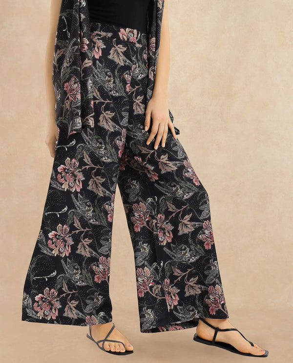 Rareism Women Posria Multi Zip Flared Ankle Length Tropical Print Trouser
