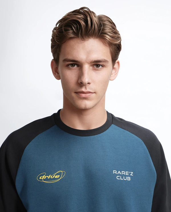 Rare Rabbit Men Revalo Teal Cotton Blend Fabric Half Sleeve Crew Neck Oversized Fit Graphic Print T-Shirt