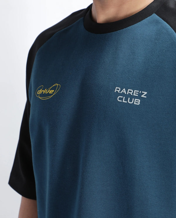 Rare Rabbit Men Revalo Teal Cotton Blend Fabric Half Sleeve Crew Neck Oversized Fit Graphic Print T-Shirt
