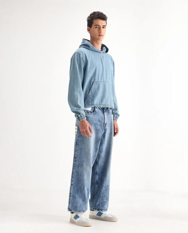 Rare Rabbit Men Riffin Light Blue Cotton Fabric Button And Zip Closure Baggy Fit Embroidered Logo Plain Jeans