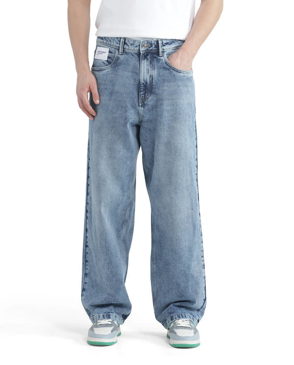 Rare Rabbit Men Riffin Light Blue Cotton Fabric Button And Zip Closure Baggy Fit Embroidered Logo Plain Jeans