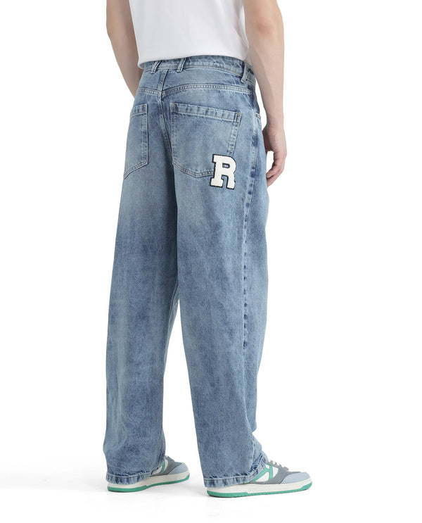 Rare Rabbit Men Riffin Light Blue Cotton Fabric Button And Zip Closure Baggy Fit Embroidered Logo Plain Jeans
