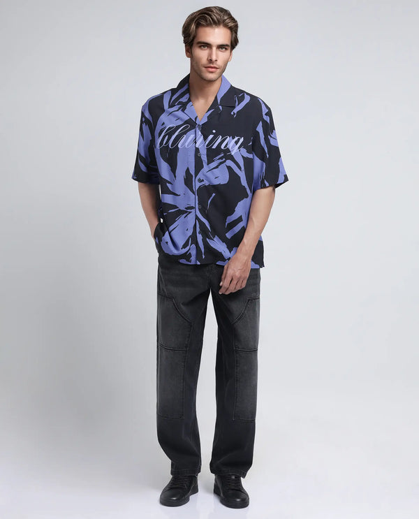 Rare Rabbit Men Rinz Black Viscose Fabric Half Sleeve Cuban Collar Button Closure Oversized Fit Abstract Print Shirt