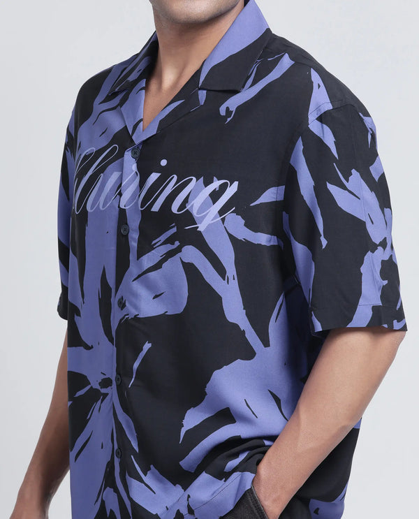 Rare Rabbit Men Rinz Black Viscose Fabric Half Sleeve Cuban Collar Button Closure Oversized Fit Abstract Print Shirt