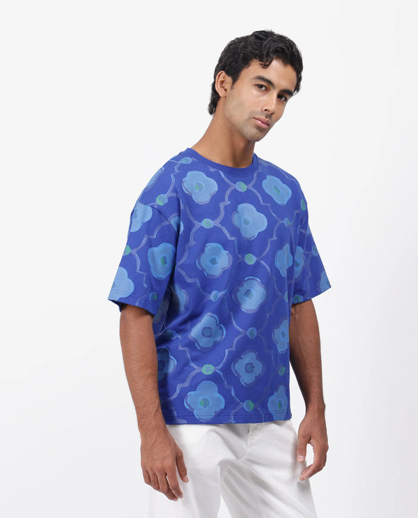 Rare Rabbit Men Evino Flouroscent Blue Cotton Fabric Short Sleeve Slip-On Oversized Fit Graphic Print T-Shirt