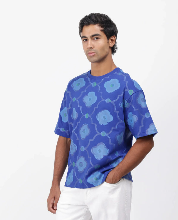 Rare Rabbit Men Evino Flouroscent Blue Cotton Fabric Short Sleeve Slip-On Oversized Fit Graphic Print T-Shirt