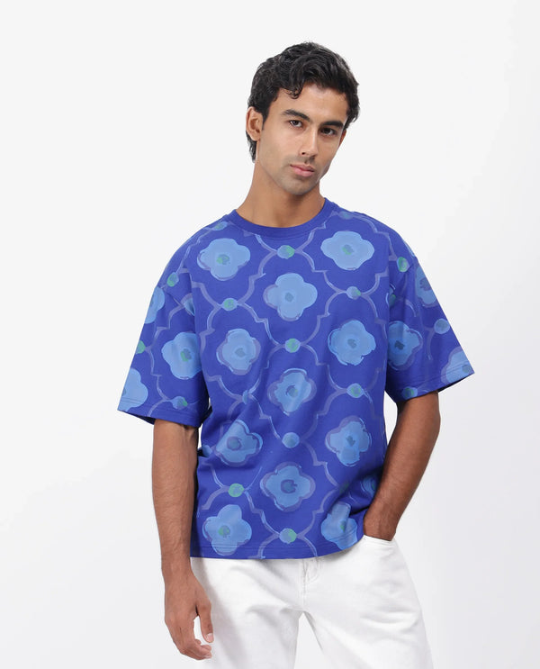 Rare Rabbit Men Evino Flouroscent Blue Cotton Fabric Short Sleeve Slip-On Oversized Fit Graphic Print T-Shirt