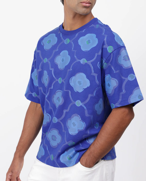 Rare Rabbit Men Evino Flouroscent Blue Cotton Fabric Short Sleeve Slip-On Oversized Fit Graphic Print T-Shirt