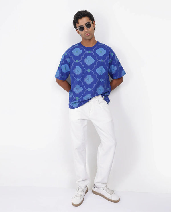Rare Rabbit Men Evino Flouroscent Blue Cotton Fabric Short Sleeve Slip-On Oversized Fit Graphic Print T-Shirt