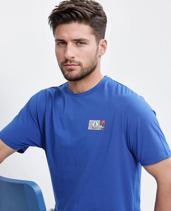 Rare Rabbit Men Saw Pastel Blue Cotton Lycra Fabric Short Sleeve Crew Neck Label Print T-Shirt