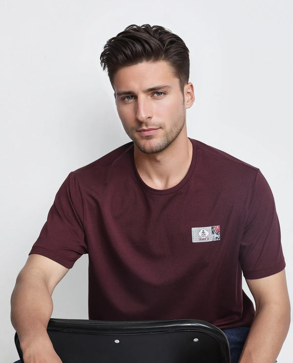 Rare Rabbit Men Saw Pastel Maroon Cotton Lycra Fabric Short Sleeve Crew Neck Label Print T-Shirt