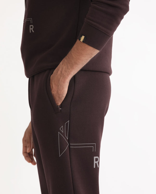 Rare Rabbit Mens Selfos Maroon Track Pant Cotton Polyester Fabric Mid Rise Knitted Draw String Closure Regular Fit