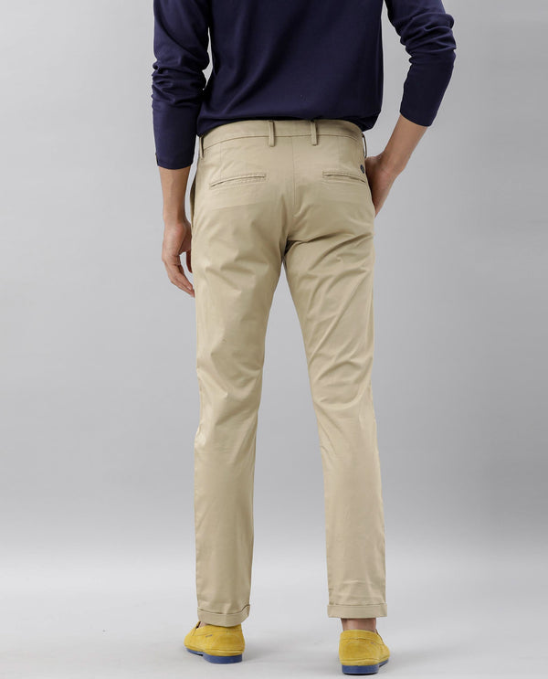 Rare Rabbit Men's Shines Beige Solid Mid-Rise Regular Fit Stretch Trousers