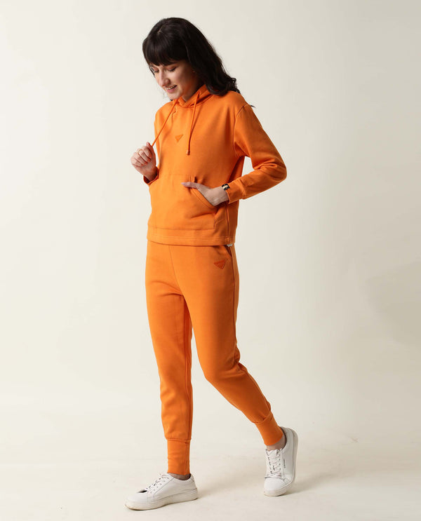Rareism Women Simp-1 Orange Poly Cotton Fabric Tailored Fit Solid Mid Rise Ankle Length Track Pant