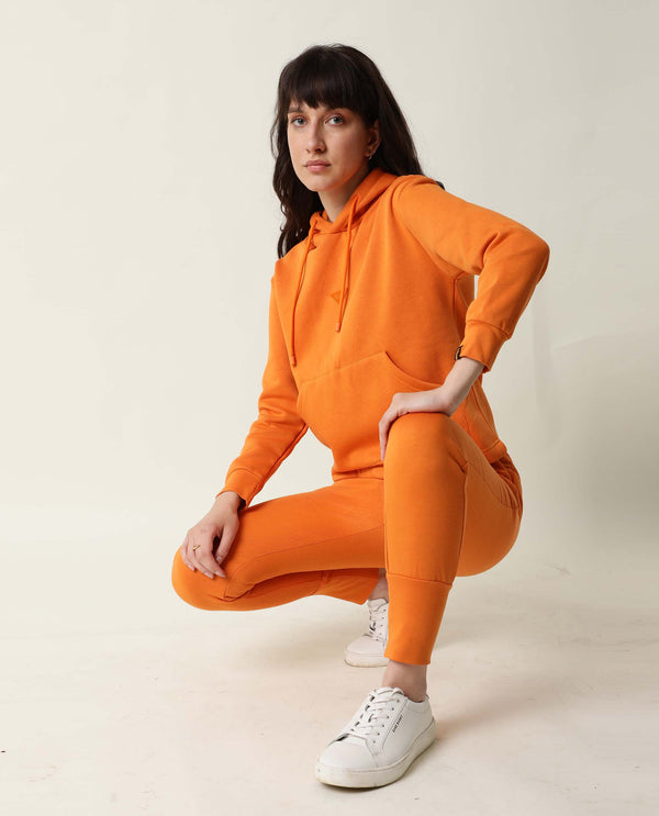 Rareism Women Simp-1 Orange Poly Cotton Fabric Tailored Fit Solid Mid Rise Ankle Length Track Pant