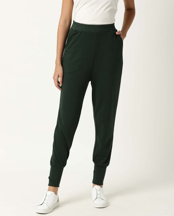 Rareism Women Simp Green Poly Cotton Fabric Tailored Fit Solid Mid Rise Ankle Length Track Pant