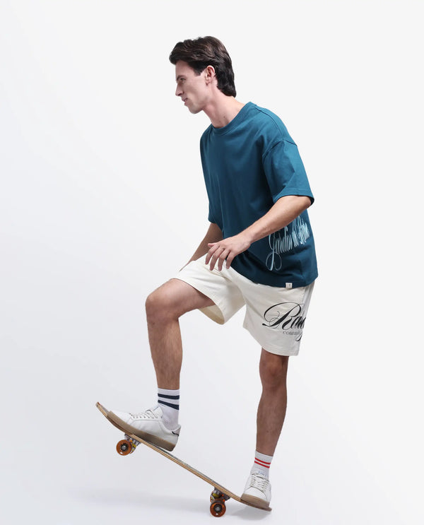 Rare Rabbit Men Siwa Dark Teal Cotton Fabric Short Sleeve Slip-On Oversized Fit Graphic Print T-Shirt