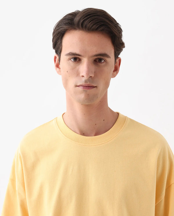 Rare Rabbit Men Siwa Light Yellow Cotton Fabric Short Sleeve Slip-On Oversized Fit Graphic Print T-Shirt