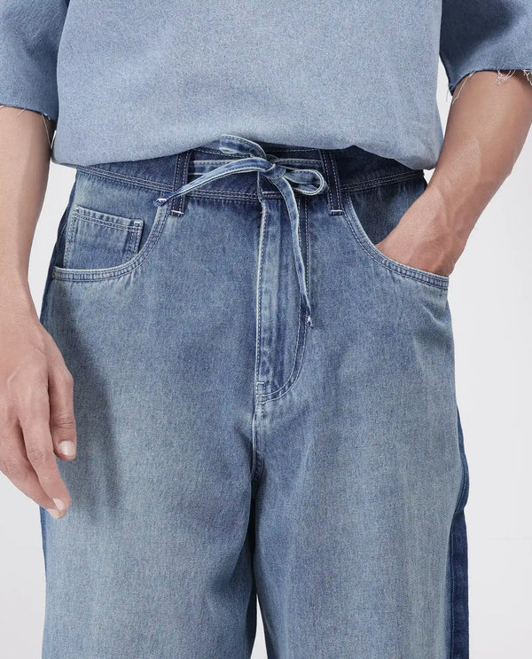 Rare Rabbit Men's Strito Light Blue Cotton Fabric Button And Zip Closure Baggy Loose Fit Plain Jeans