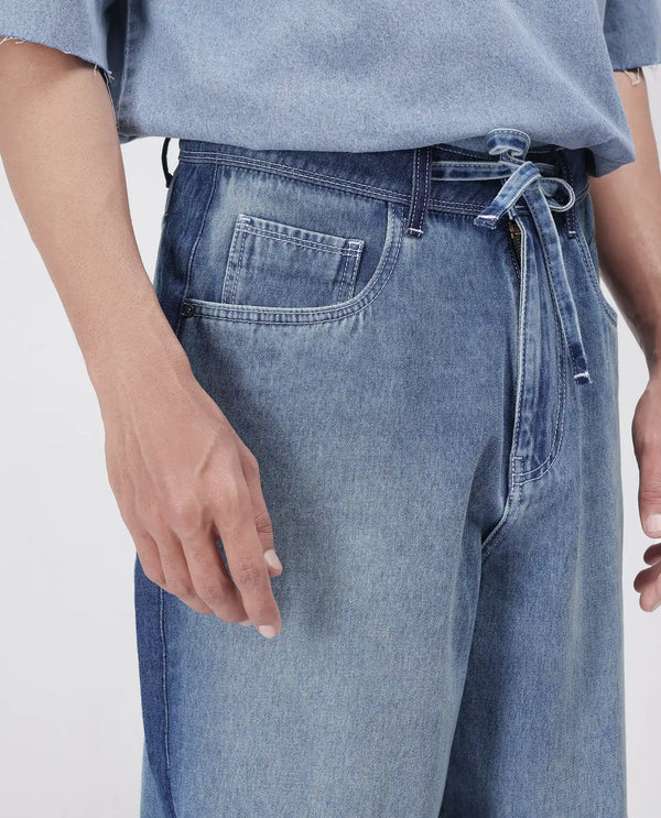 Rare Rabbit Men's Strito Light Blue Cotton Fabric Button And Zip Closure Baggy Loose Fit Plain Jeans