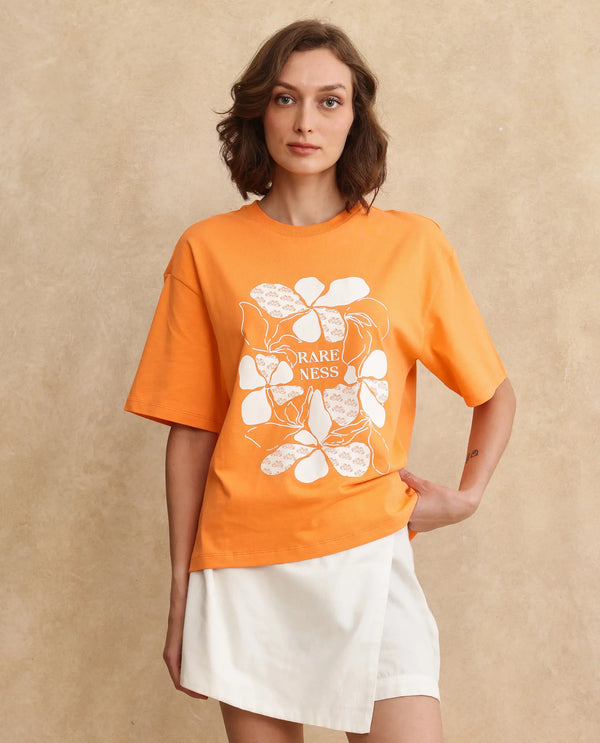 Rareism Women Stunt Orange Cotton Blend Fabric Short Sleeve Crew Neck Oversized Fit Graphic Print T-Shirt