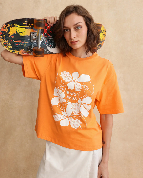 Rareism Women Stunt Orange Cotton Blend Fabric Short Sleeve Crew Neck Oversized Fit Graphic Print T-Shirt
