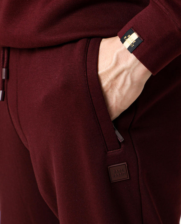 Rare Rabbit Men's Titan Maroon Cotton Polyester Fabric Relaxed Fit Mid Rise Track Pant