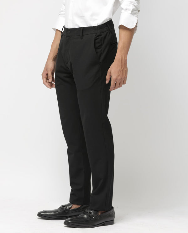 Rare Rabbit Men's Travel-24 Black Poly Viscose Lycra Fabric Blend Solid Trousers