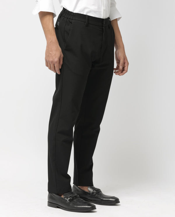 Rare Rabbit Men's Travel-24 Black Poly Viscose Lycra Fabric Blend Solid Trousers
