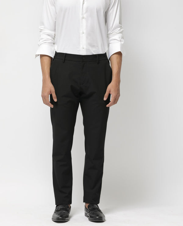 Rare Rabbit Men's Travel-24 Black Poly Viscose Lycra Fabric Blend Solid Trousers