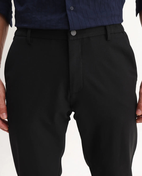 Rare Rabbit Men Travel-Aw25 Black Polyester Blend Fabric Button Closure Plain Trouser