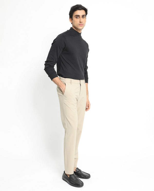 Rare Rabbit Men's Traveller Beige Solid Mid-Rise Regular Fit Trouser