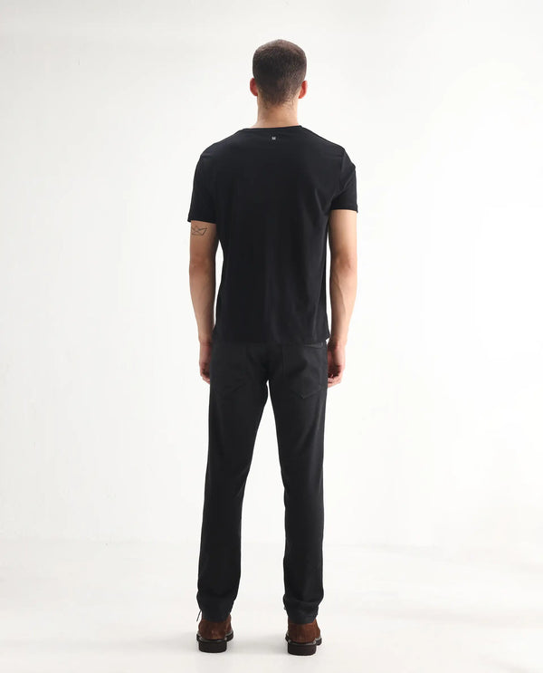 Rare Rabbit Men Umo Black Cotton Polyester Fabric Slim Fit Plain Denim Pant