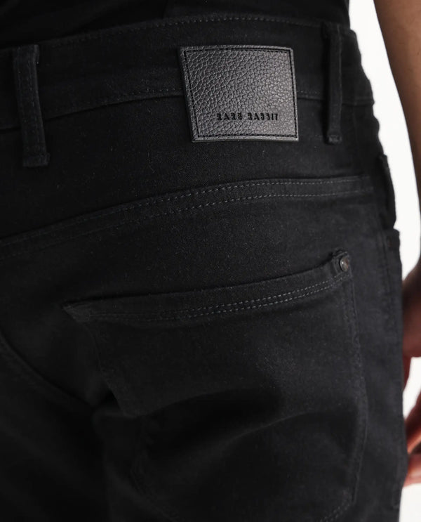 Rare Rabbit Men Umo Black Cotton Polyester Fabric Slim Fit Plain Denim Pant