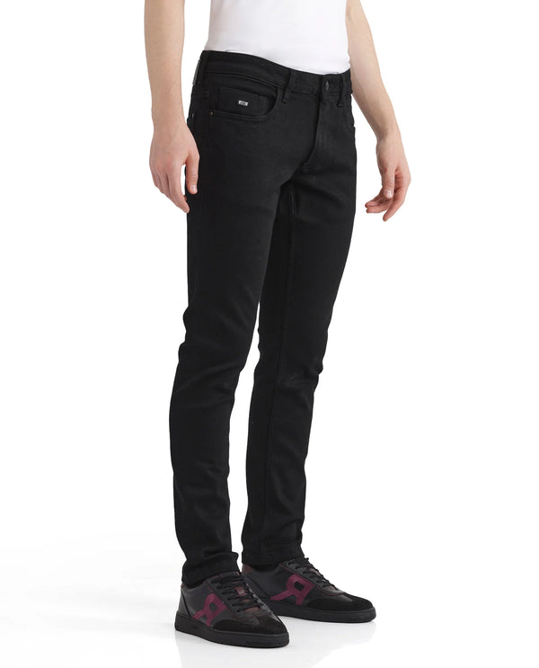 Rare Rabbit Men Umo Black Cotton Polyester Fabric Slim Fit Plain Denim Pant