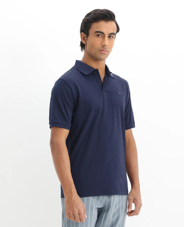 Rare Rabbit Men Vinc Navy Cotton Fabric Short Sleeve Silicon Badge Button Closure Plain Polo